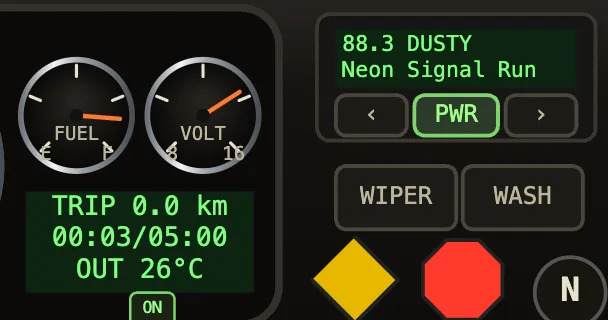 The trip computer and the radio panel on the dash
